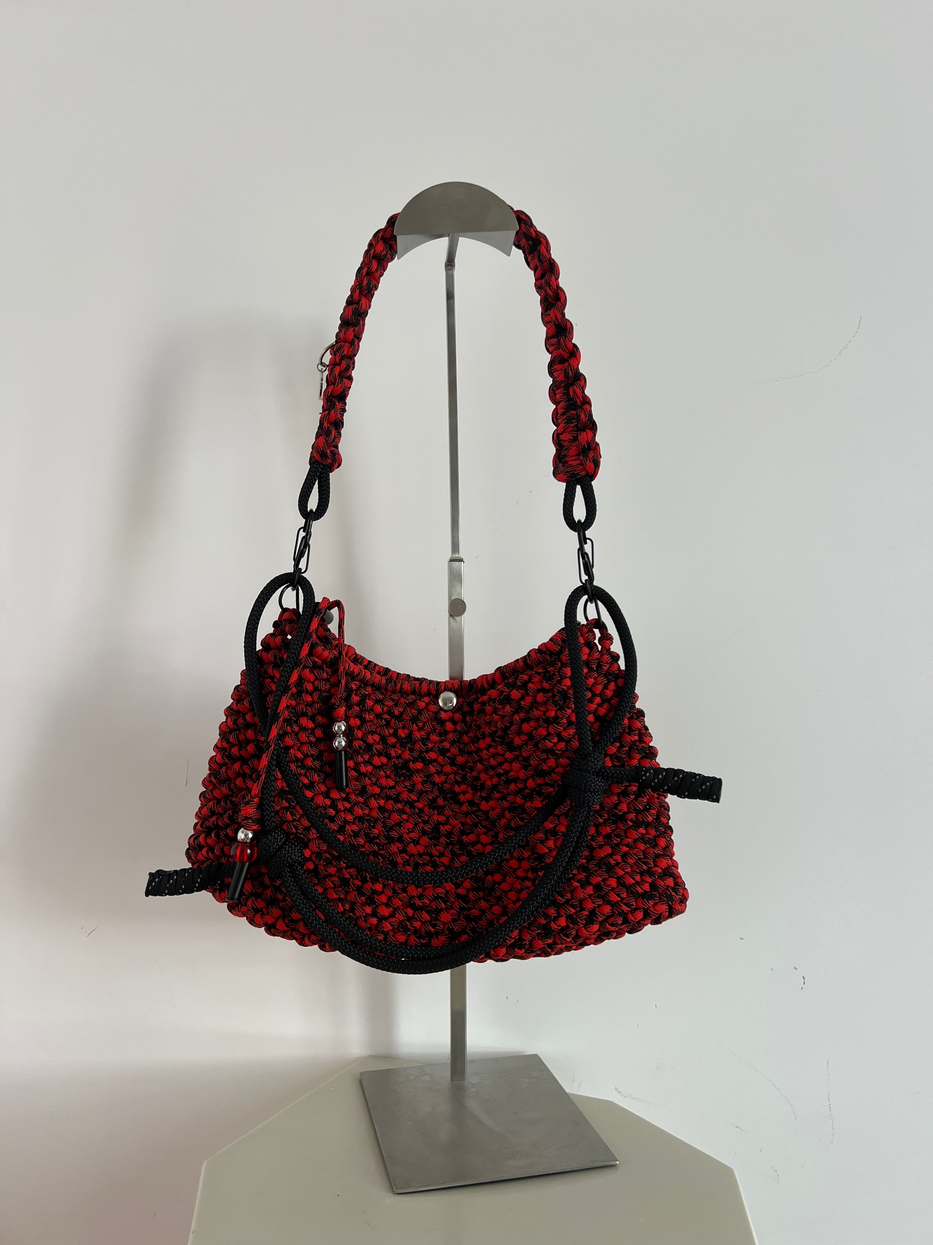 Red and black mixed Wednesday bag