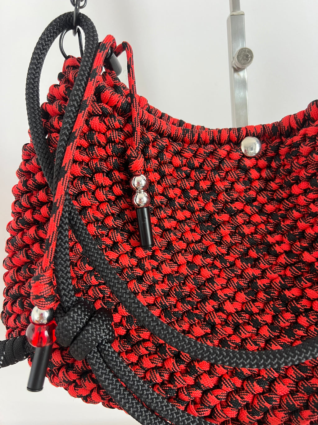 Red and black mixed Wednesday bag