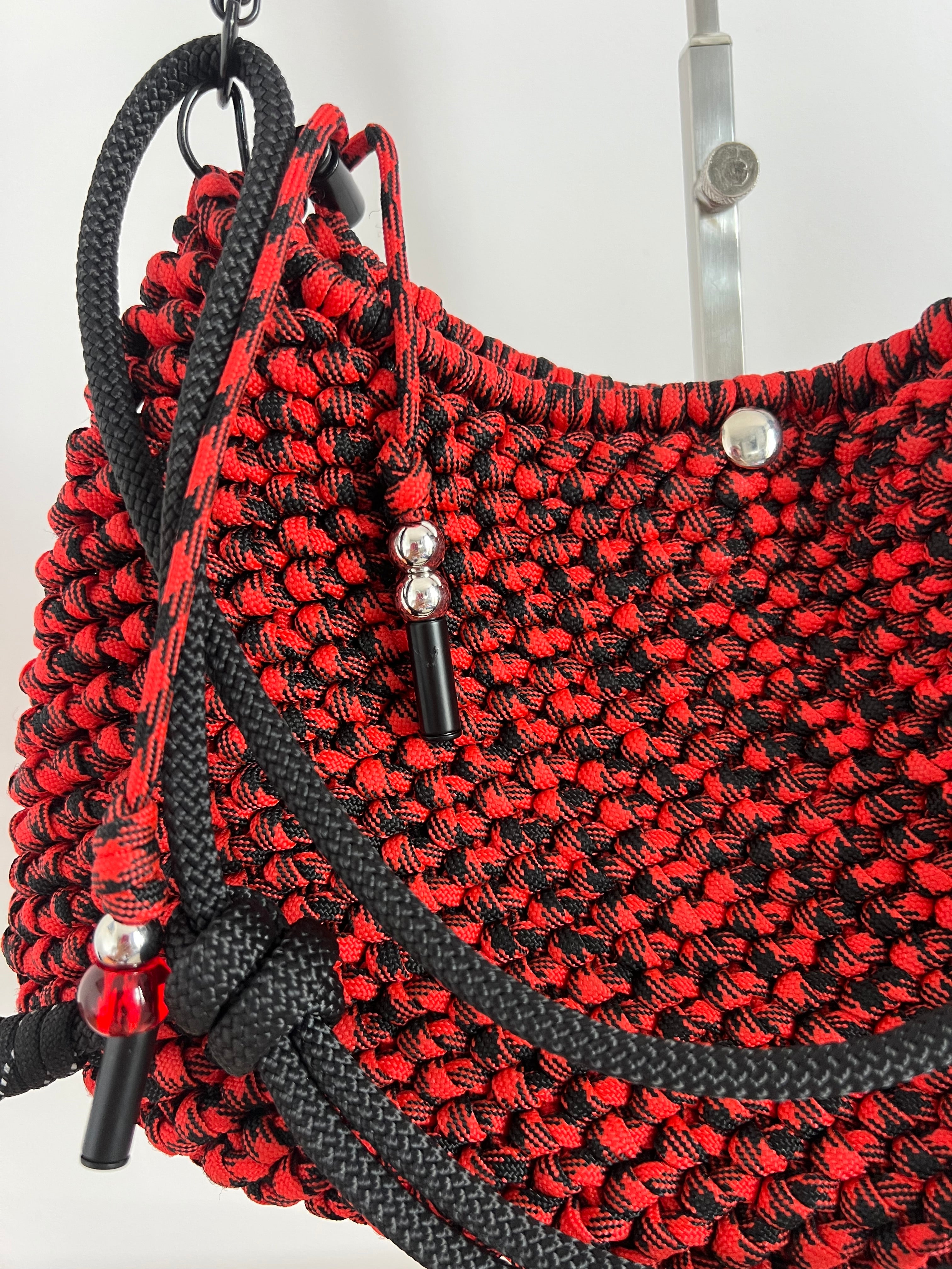 Red and black mixed Wednesday bag