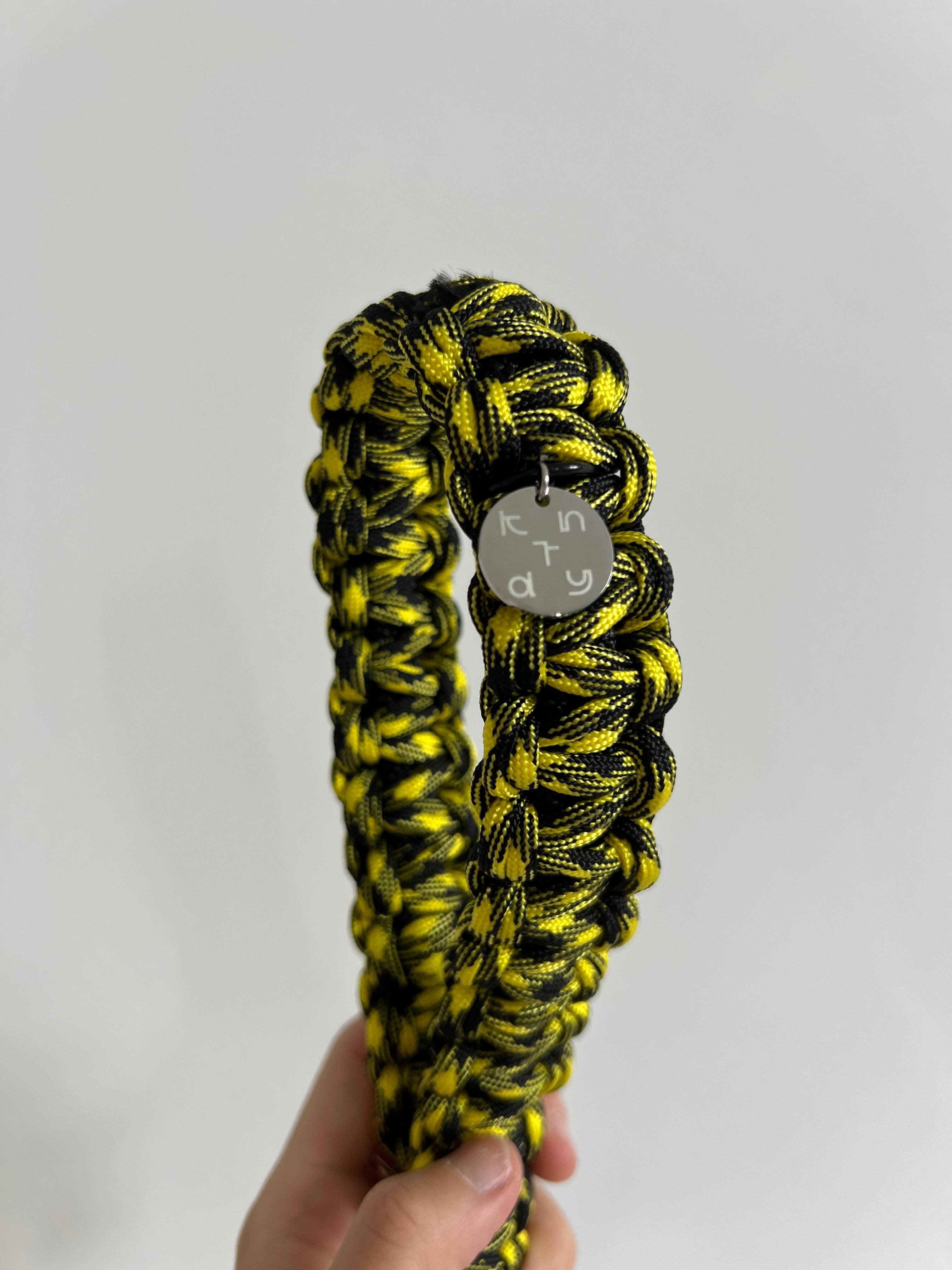 Yellow and black Wednesday bag