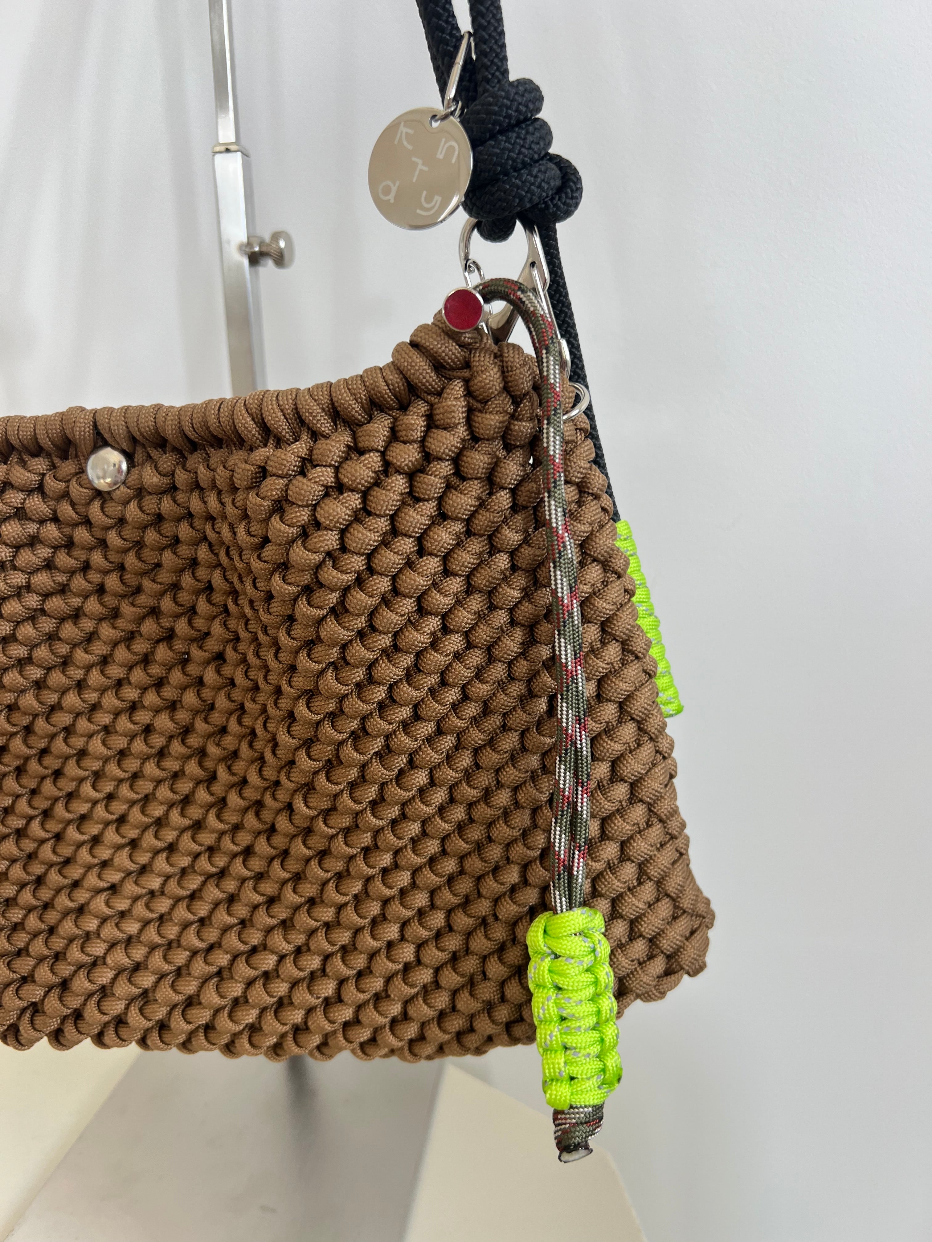 Brown and neon cycle bag